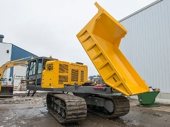 The entire upper frame is attached to the bottom chassis and tracks by a mechanism.