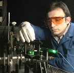 Fariborz Kargar, a graduate student researcher at UCR, measures the acoustic phonon dispersion in the semiconductor nanowires. Image credit: UCR