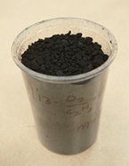 The low-density graphene aerosol gel in this container was created by a hydrocarbon detonation method recently patented by Kansas State University researchers.