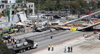 Rescue workers and investigators gather at the site following the span's collapse. Source: Miami Herald via KLRN 