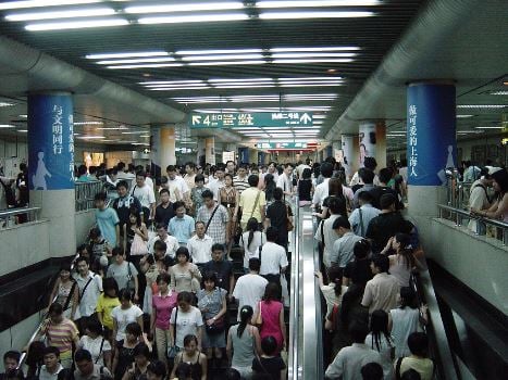 Commuters at a central metro station in Shanghai. Image source: wikipedia