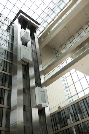 Twin elevators require a smaller footprint than conventional elevators, boosting leasable space. Image credit: Thyssenkrupp.