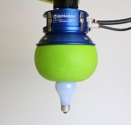 Empire Robotics’ Versaball uses an elastic polymer ball filled with a sand-like material to grip objects like this light bulb.