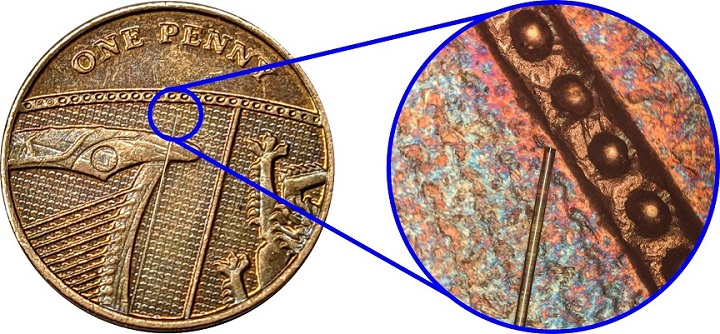 Optical fiber probe shown against a penny for perspective. Source: Nottingham University