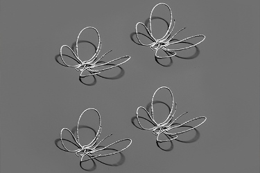 3D butterflies printed without a support structure. Credit: Lewis Lab / Wyss Institute at Harvard University.  