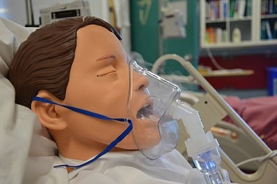 A nebulizer is used to administer drug treatments to a patient suffering from a variety of respiratory ailments. Source: Wikimedia Commons by British Columbia Institute of Technology 