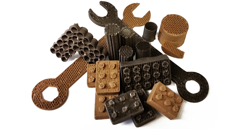 The research team created the lunar and Martian 3-D paints using the respective dusts, a series of simple solvents and biopolymer, then 3-D printed them with a simple extrusion process. Image credit: Northwestern University