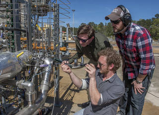 Engineers prepare a 3D-printed turbopump for a test at NASA&rsquo;s Marshall Space Flight Center. 