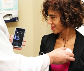 When the app is activated, sounds can be played via smartphone speaker and images appear on the screen. Image credit: Orlando Health.
