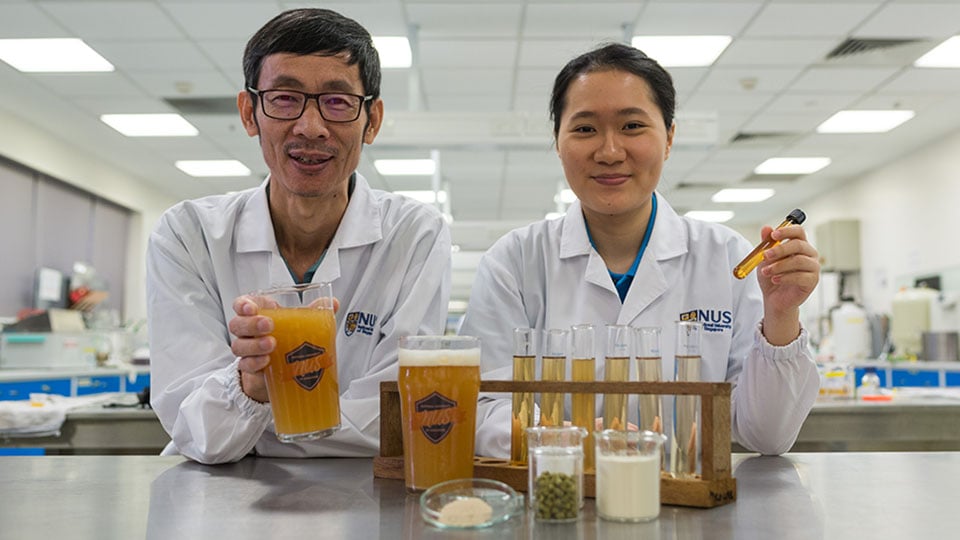 Associate Professor Liu Shao Quan (left) and Miss Chan Mei Zhi Alcine (right) from the Food Science and Technology Programme at NUS created a novel probiotic beer that boosts immunity and improves gut health. Image credit: NUS