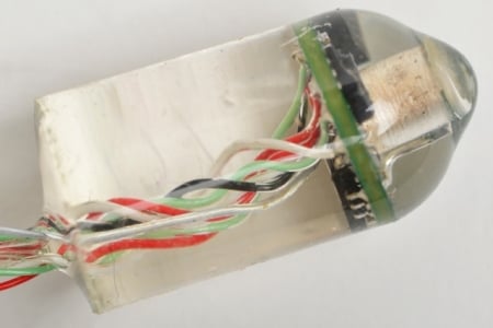 This ingestible electronic device can measure heart and respiratory rates from inside the gastrointestinal tract. Image credit: Albert Swiston/MIT Lincoln Laboratory.