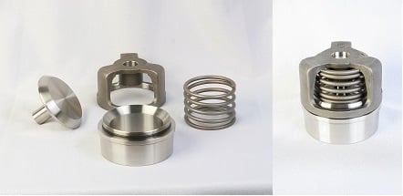 Figure 1. The individual components of the TPCI WG Sphera series spherical valve (left) and a fully assembled version (right) showing the large spring option. Source: Triangle Pump Components Inc.