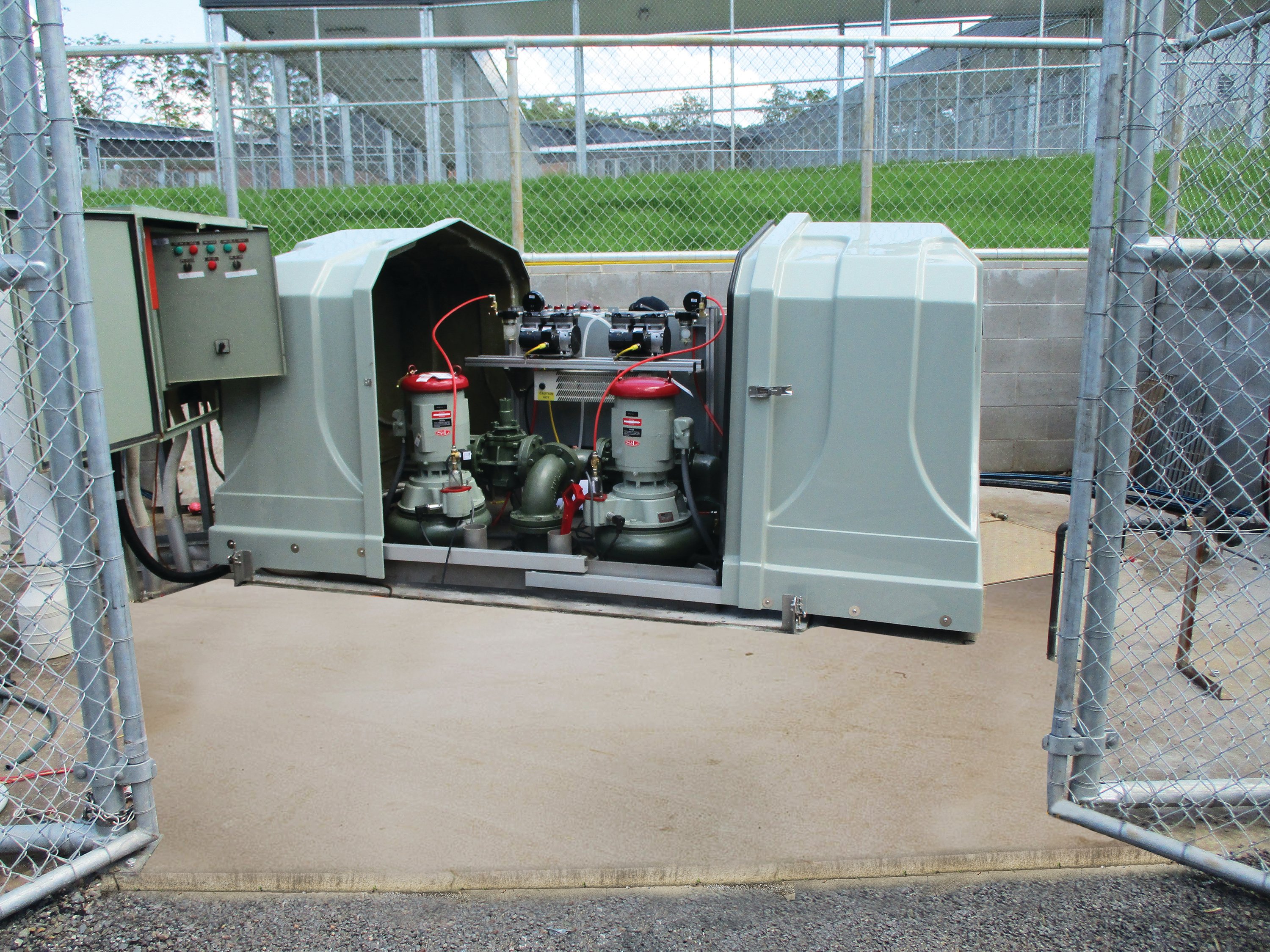 Figure 2: The EVERLAST™ above-ground pumping station at this prison facility simplifies operator access and eliminates confined space concerns by mounting a complete lift station at grade level in a quick-access enclosure. Source: Smith & Loveless