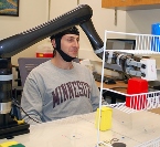 Research subjects fitted with a brain cap moved the robotic arm by imagining moving their own arms. Credit: University of Minnesota