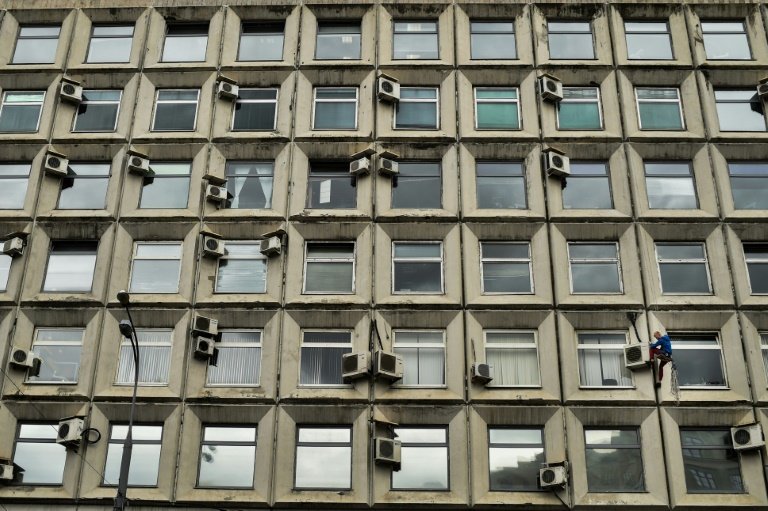 Air conditioners on a building in Moscow, part of a worldwide demand for cooling systems that is expected to triple over the next 30 years.