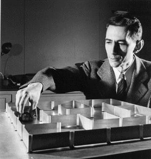Claude Shannon and experimental mouse maze constructed of relays that demonstrated machine learning. Image source: computerhistory.org