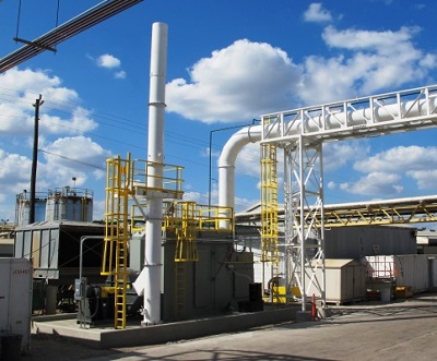 Figure 2: 13,000 CFM Fiberbed filter installed to control emissions on an asphalt coater/saturator. Zero opacity and three-year filter life are the system’s key attributes.