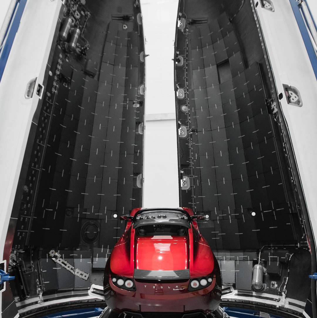 Elon Musk’s Tesla Roadster will serve as the test launch’s mass simulator, packed in Falcon Heavy’s composite payload fairing. Source: Elon Musk/Instagram