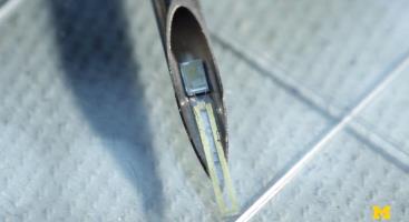 The tiny radio communicates through tissue. (Image credit: University of Michigan)