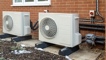 Promoting residential heat pumps for building decarbonization