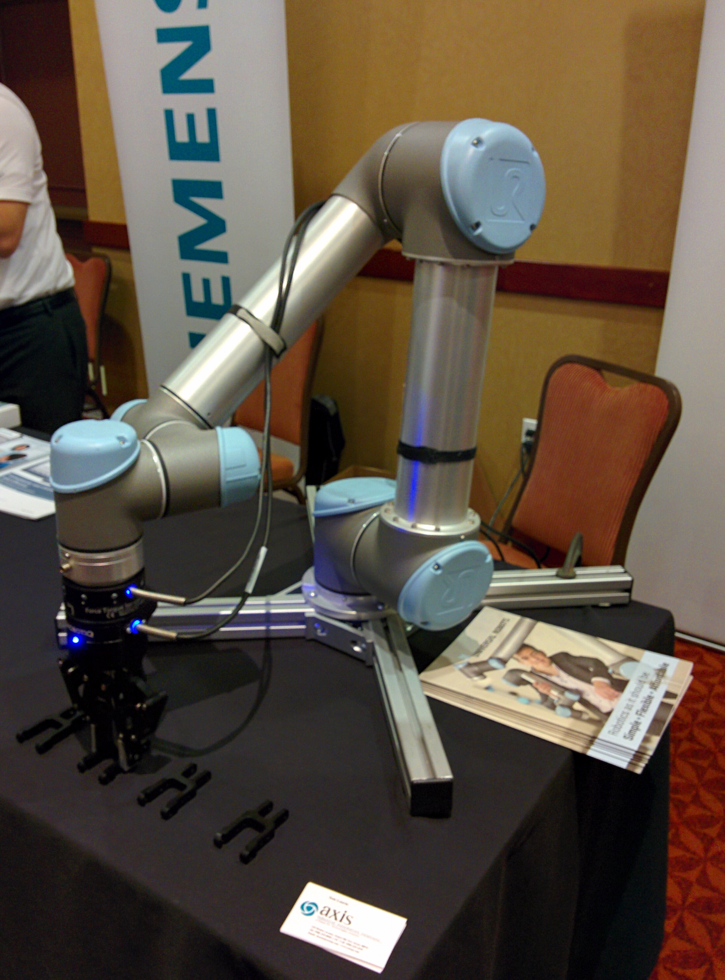 A Universal Robots cobot arm on display at the New York Automation and Robotics Conference 2017.