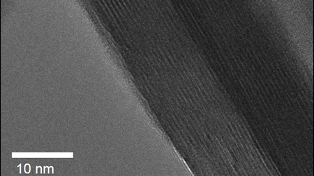 Low temperature high resolution transmission electron microscope image of a platelet of tungsten oxide dihydrate; the "stripes" are individual layers of atoms separated by water layers. Image credit: Veronica Augustyn and James LeBeau