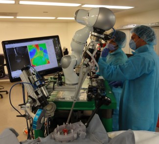 With its hydraulic arm wielding a surgical tool, STAR is billed as the first robot to autonomously perform soft-tissue surgery.