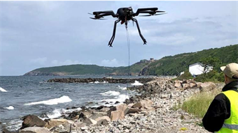 Magnetometer-mounted drones sweep for mines, unexploded bombs