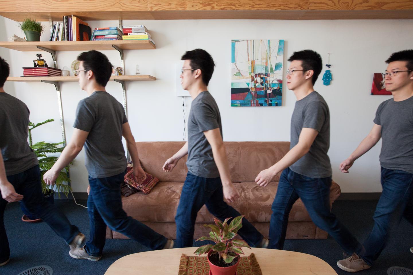 WiGait uses wireless signals to continuously measure a person's walking speed. Image credit: Jason Dorfman, MIT CSAIL 