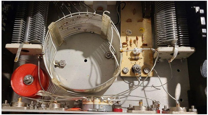 The large air capacitor is shown on the left, with the plates overlapping nearly completely. Source: Seth Price