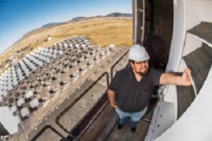 Sandia National Lab’s intern Jesus Ortega inspects one of the new bladed receivers at Sandia’s National Solar Thermal Testing Facility. (Photo by Randy Montoya) 