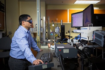 NETL researchers are using laser induced breakdown spectroscopy as one of several techniques to identify rare earth elements present in coal and coal by-products. Image credit: NETL