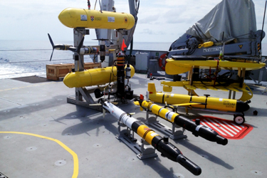 Several classes of the AUVs await deployment on the deck of the Falkor, off the coast of western Australia. Source: MIT