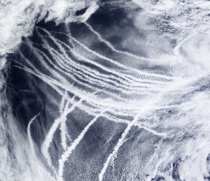 Ships crossing the Pacific Ocean emit particles into the clean air that create a seed for marine clouds. Image credit: NASA