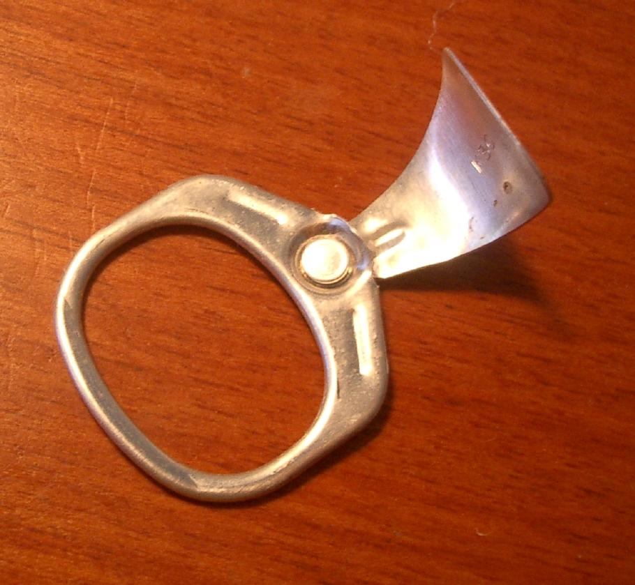 The pull-tab was an improvement over can opening via church key, but tabs were frequently discarded as litter.