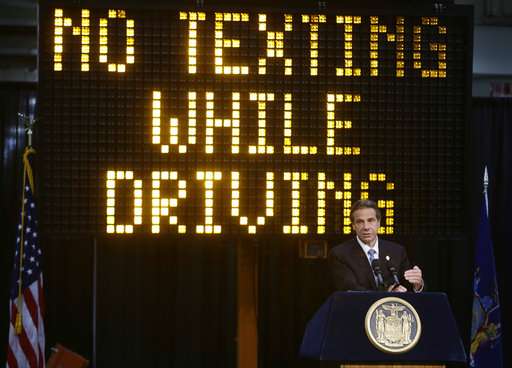 In this May 31, 2013 file photo, New York Gov. Andrew Cuomo speaks during a news conference to announce the increase in penalties for texting while driving in New York. New York state is set to study the use of a device known as the "textalyzer" that would allow police to determine whether a motorist involved in a serious crash was texting while driving. Image credit: AP Photo/Frank Franklin II, File